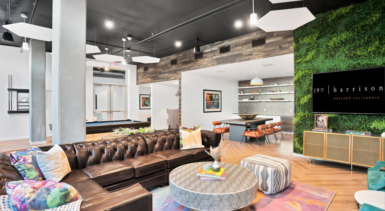 lounge with seating table and tv