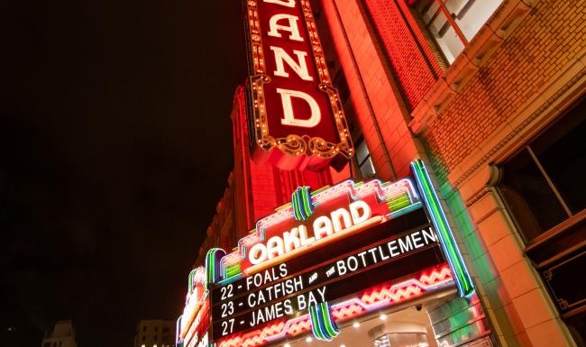 The essence of exceptional living a building with neon signs