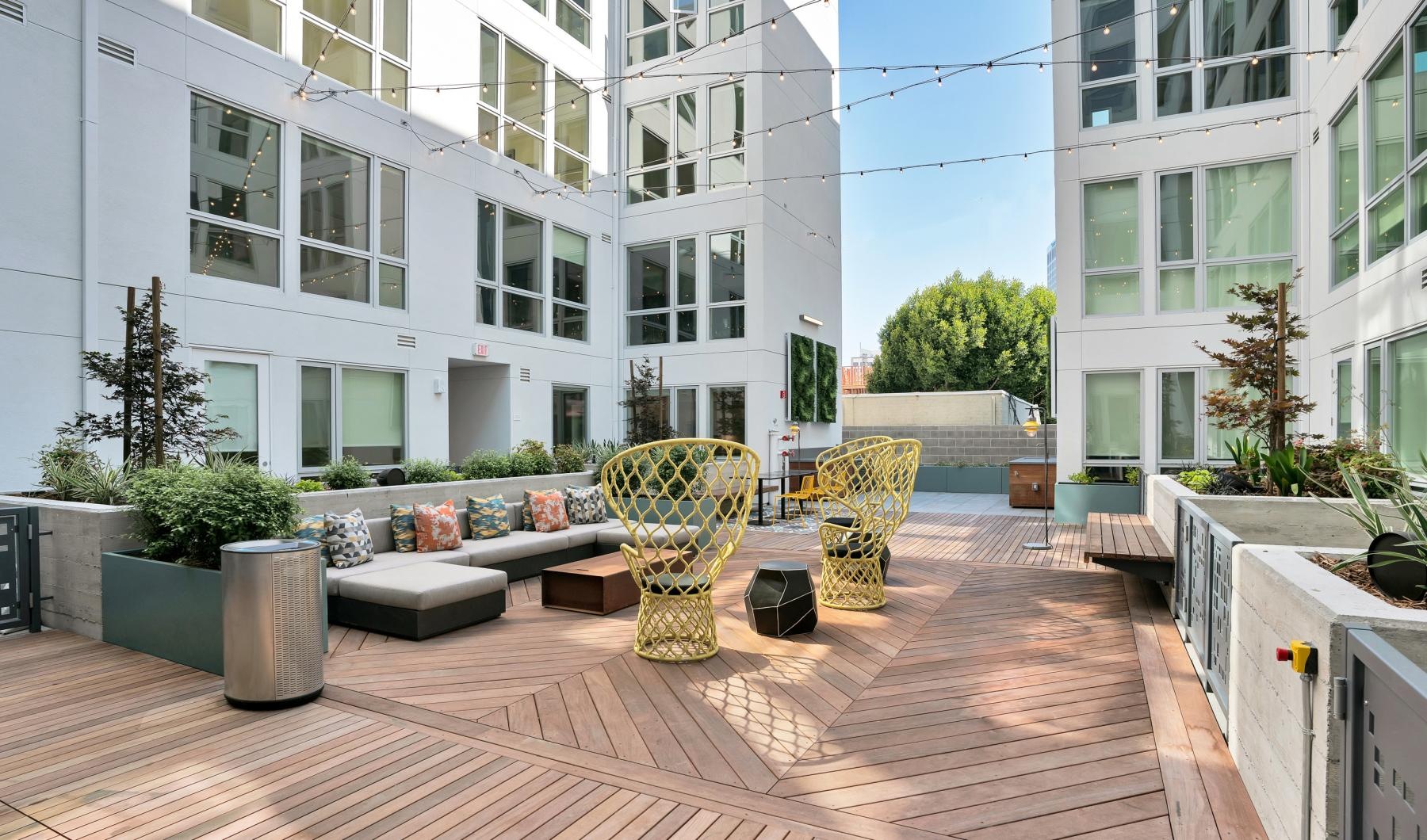 Find your perfect fit at 19th & Harrison a brick patio in front of a building
